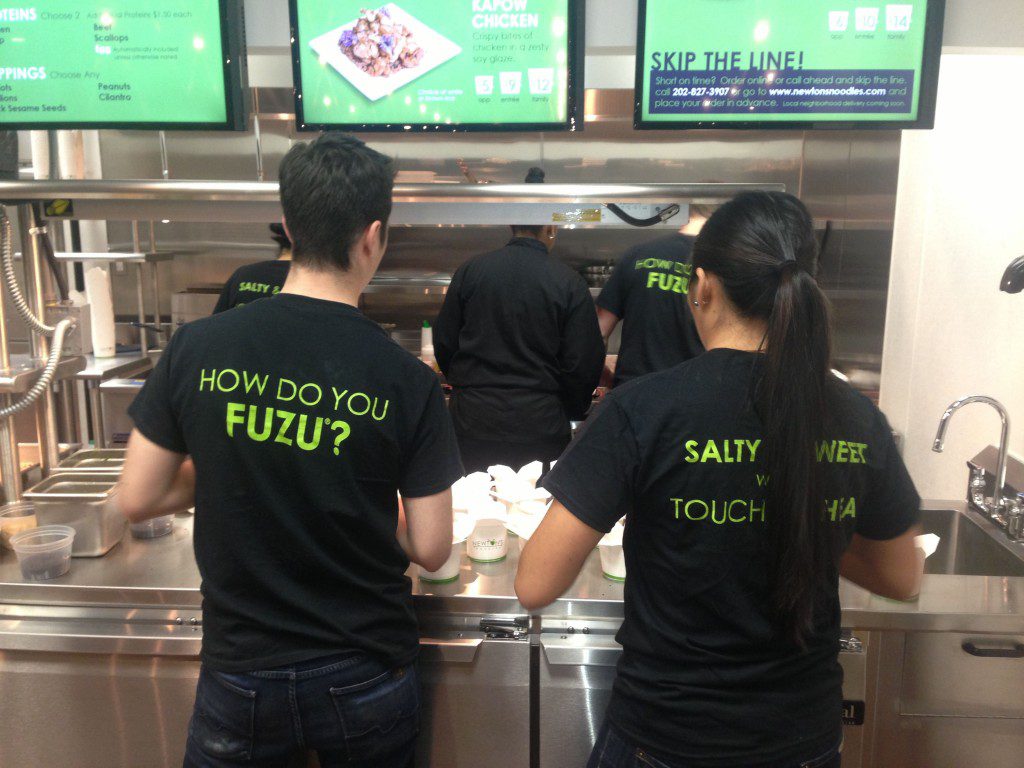 Workers behind the counter